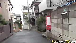 Out in the open urinating asians